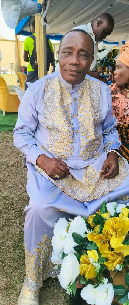 Apostle Prosper in regal traditional attire